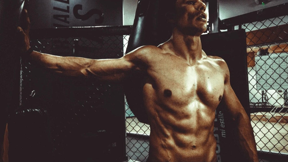 athlete gym MMA shirtless TimTam Pulse Massager